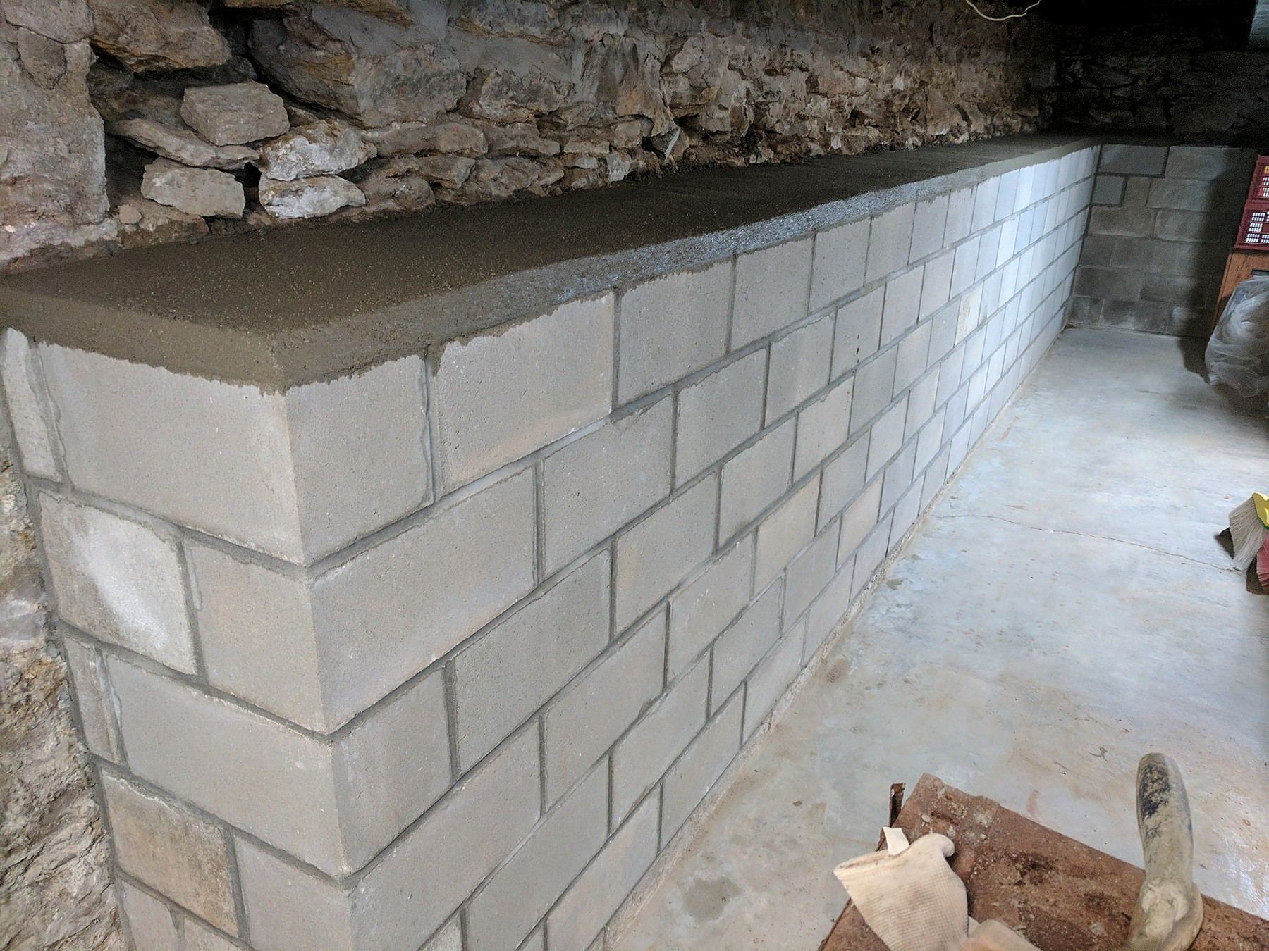 Basement block shelf wall